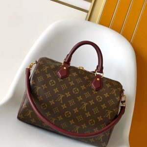 Alternative view of p680 Black  M15108 Dune Top-Grade Original Order Dynamic Variable Code Speedy Soft 30 Boho Handbag crafted from classic Monogram coated canvas, with leather lining and zippered inner pocket adding color contrast.Ostrich leather trim and beaded chain draw the eye, while the key holder and address tag add thoughtful details. Toron handles offer versatile carrying options. 30.0 x 21.0 x 17.0 cm (L x H x W) • Monogram coated canvas • Ostrich leather trim • Metal hardware • Double zipper closure •Zippered interior pocket • Beaded chain • Key holder • Nameplate • Holds 9-inch tablet, Zippy wallet, 6.7-inch smartphone, keys, tissues, earphones, lipstick, and sunglasses • Weight: 0.8 kg • Shoulder strap: Detachable, non-adjustable • Strap length: 24.0 cm • Handles: Dual handles